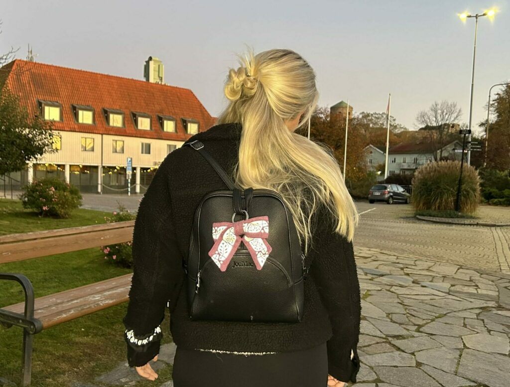 Pynt ryggsekken med en refleksrosett