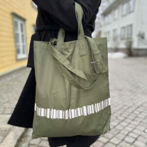 Praktisk refleks‑stoffpose i slitesterk bomull i mosegrønn med mønster: Nordlys – Smart in the dark