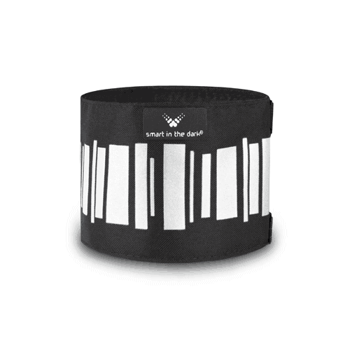 Smart reflex accessoar till armar och ben med justerbara kardborreband. Svart med reflexmönster likt norrsken runtom.