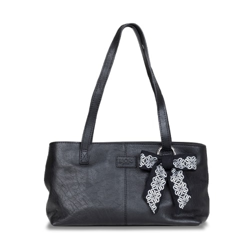 Väska med reflexrosett. I färgen svart med reflexmönster av fyrklöver.