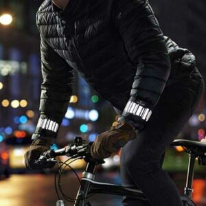Smart cyclist wearing a reflective arm band for running or walking from Smart in the dark