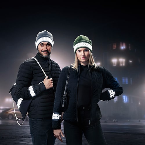 couple wearing reflective beanie hat with 3m accessories for safety