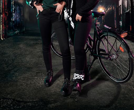 Girl with reflective leg band - Reflective Gear for Cycling to wear when taking the bike to work - Smart in the dark