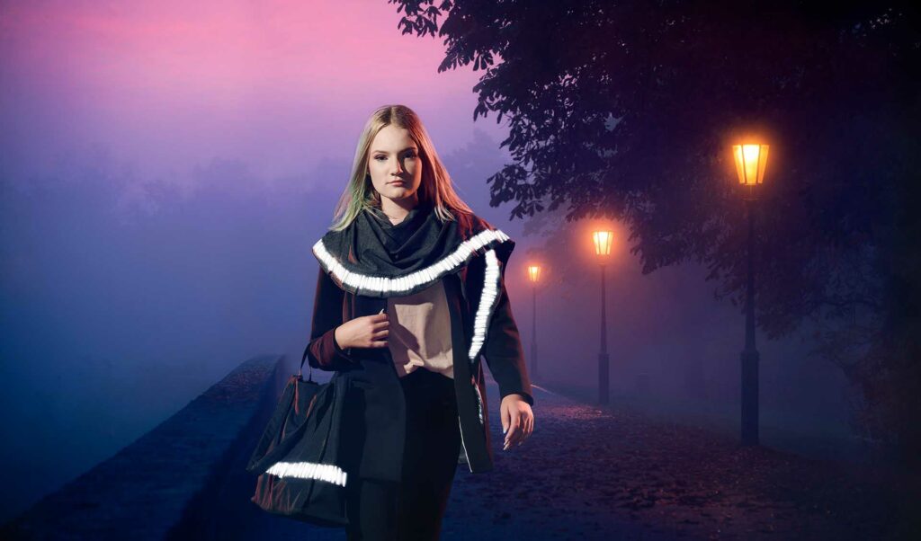 Girl with safety reflectors for walking - Smart in the dark