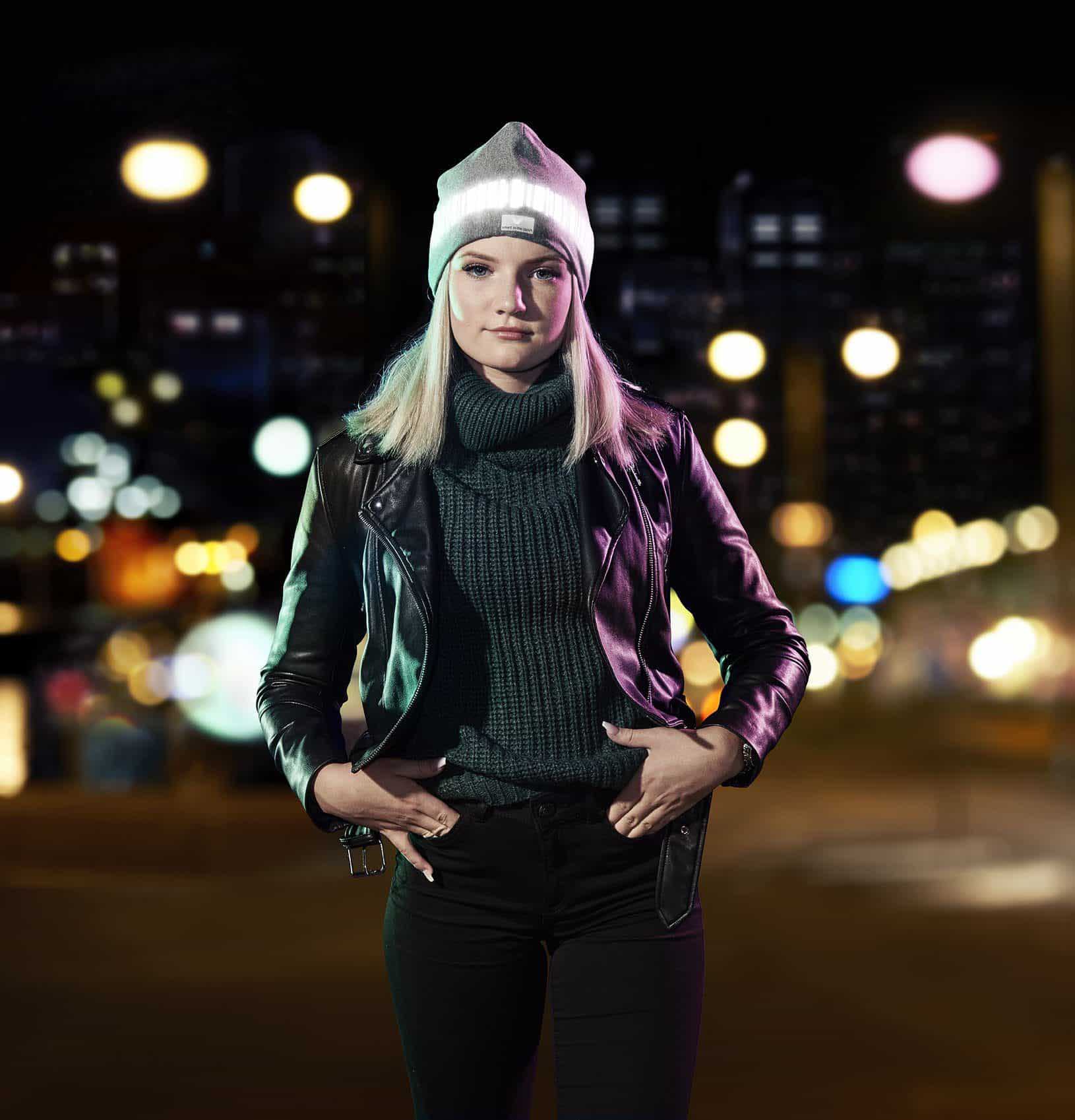 Reflective Gear for Walking at Night - Girl with Smart in the dark Reflective Beanie out walking