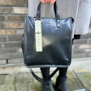 Cute bag charm with a reflector, in moss green with a Braid design. Smart in the dark