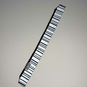 Loke large reflective sleeve in black for dog leashes and bag straps, pattern: Norden light. Lightweight design with 3M Scotchlite for high visibility in traffic. Smart in the dark