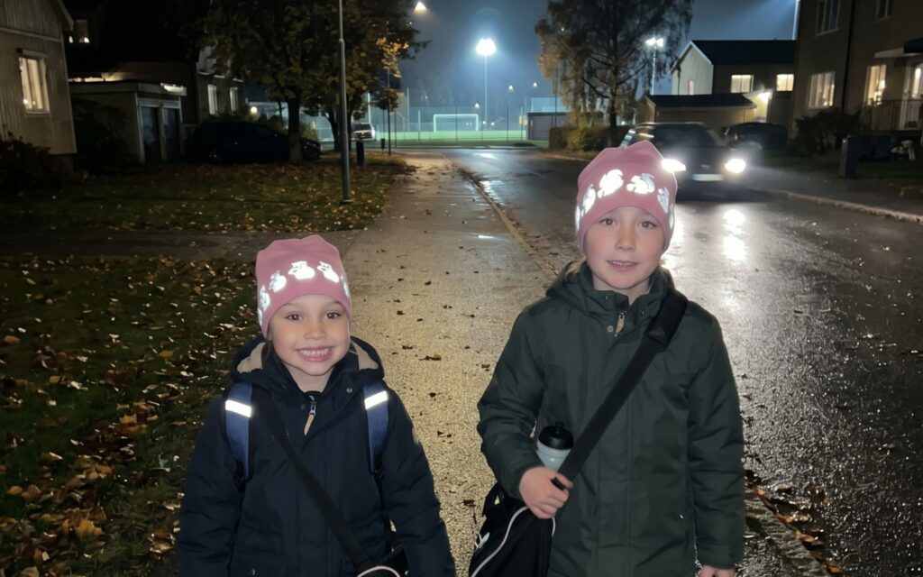 after school activity safety children wearing pink reflective beanies from smart in the dark that glow brightly in the dark.