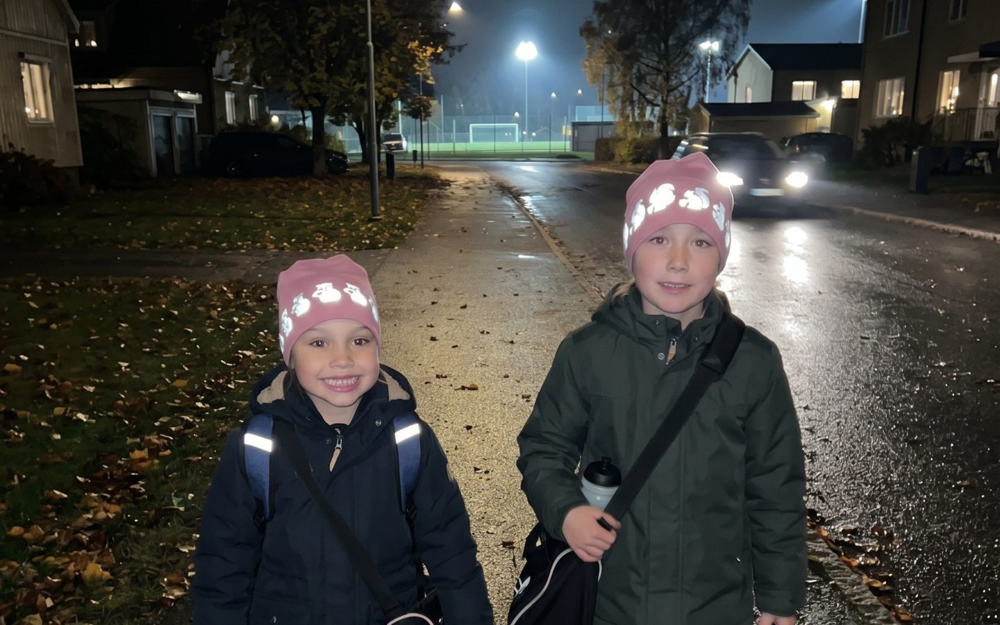 after school activity safety children wearing pink reflective beanies from smart in the dark that glow brightly in the dark.